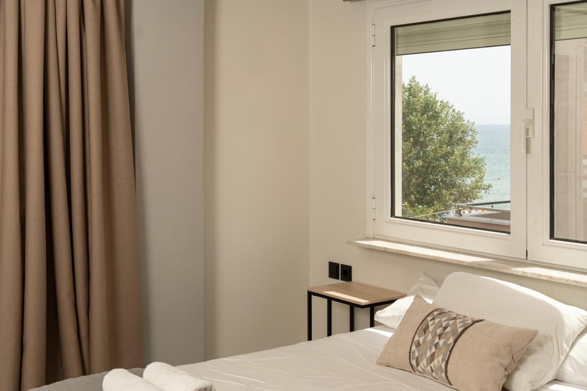 Aqua Beachfront Elegant Hotel Olympic Beach Exterior photo
